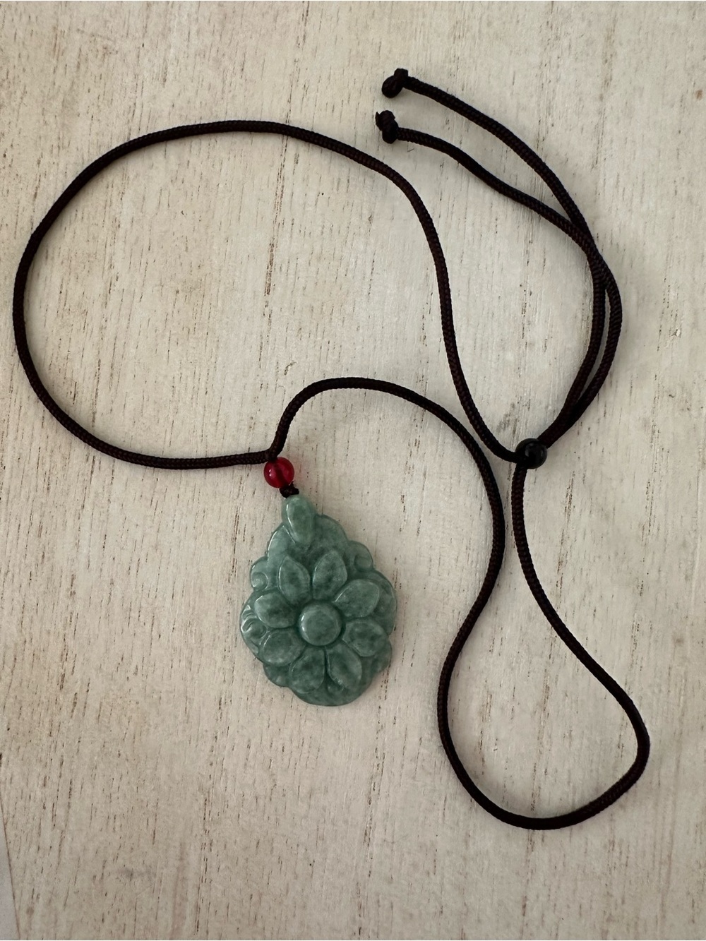 Carved Green Floral Jade Pendant Necklace with Red Accent - Unbranded